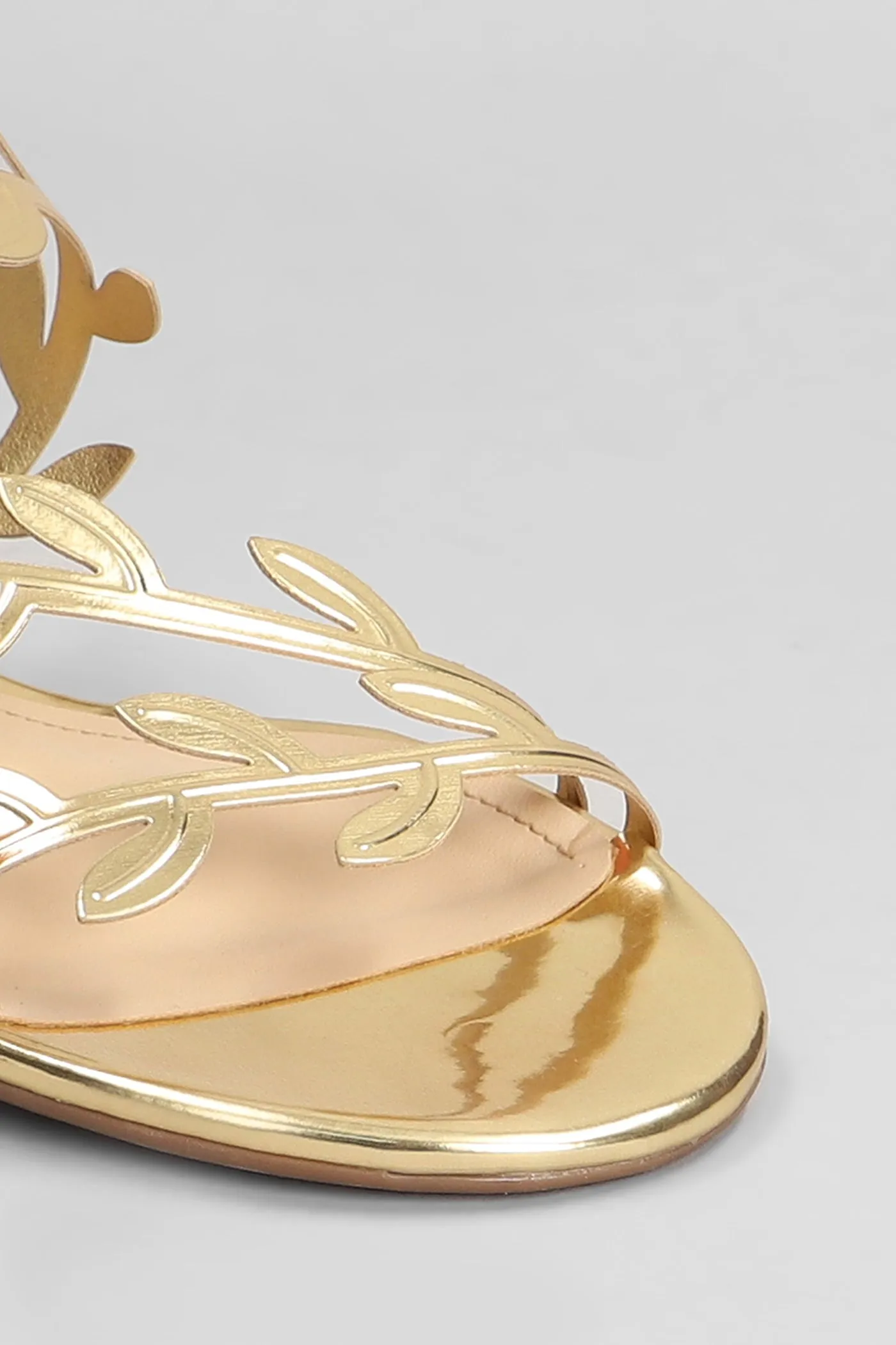 Flats in gold leather