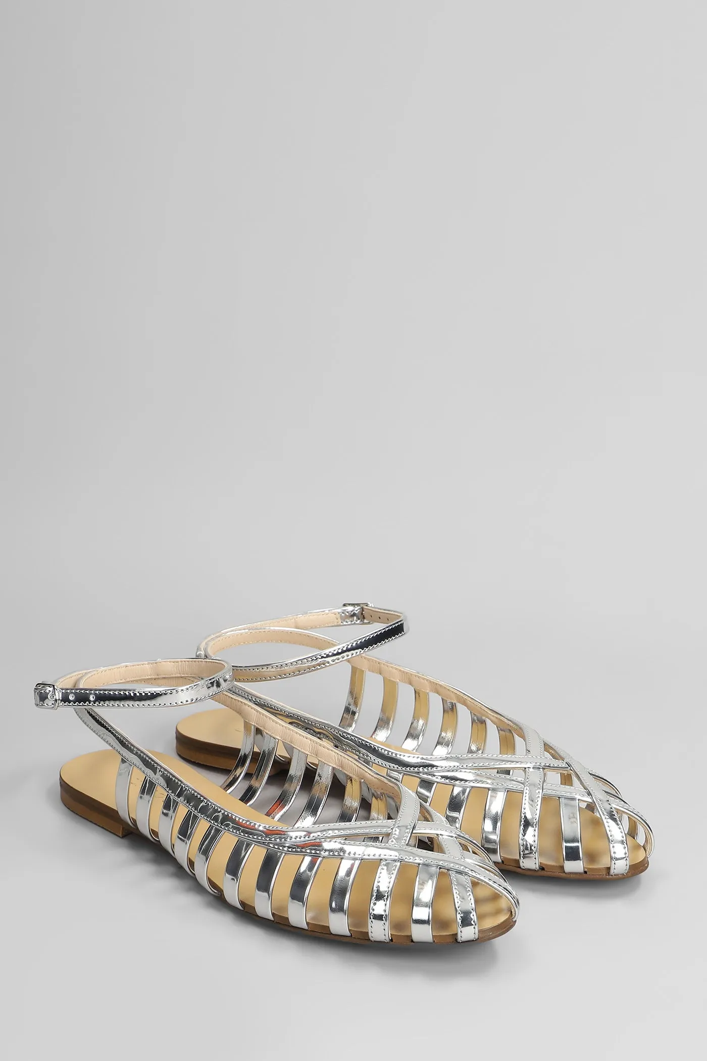 Flats in silver leather