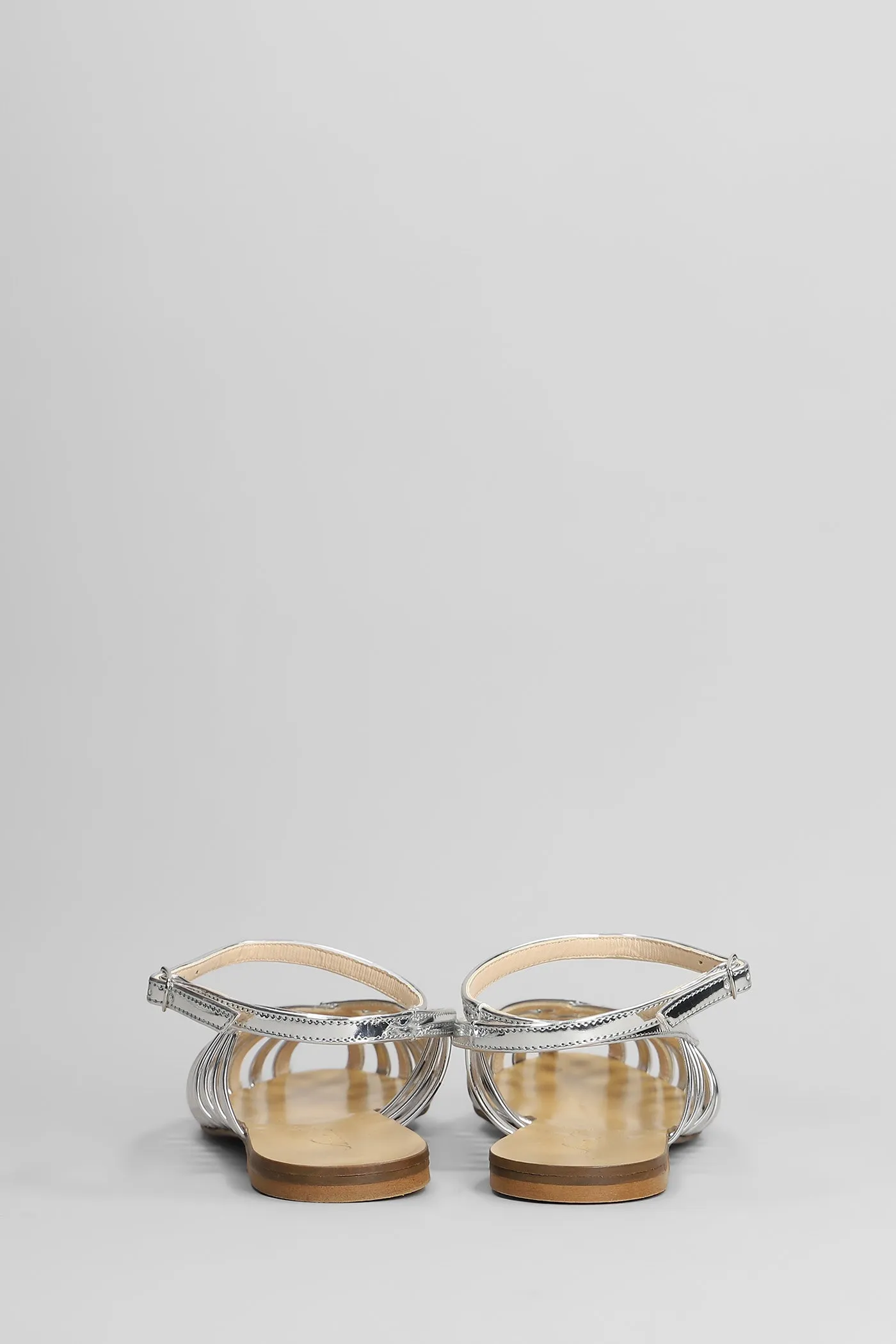 Flats in silver leather