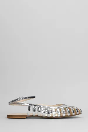 Flats in silver leather