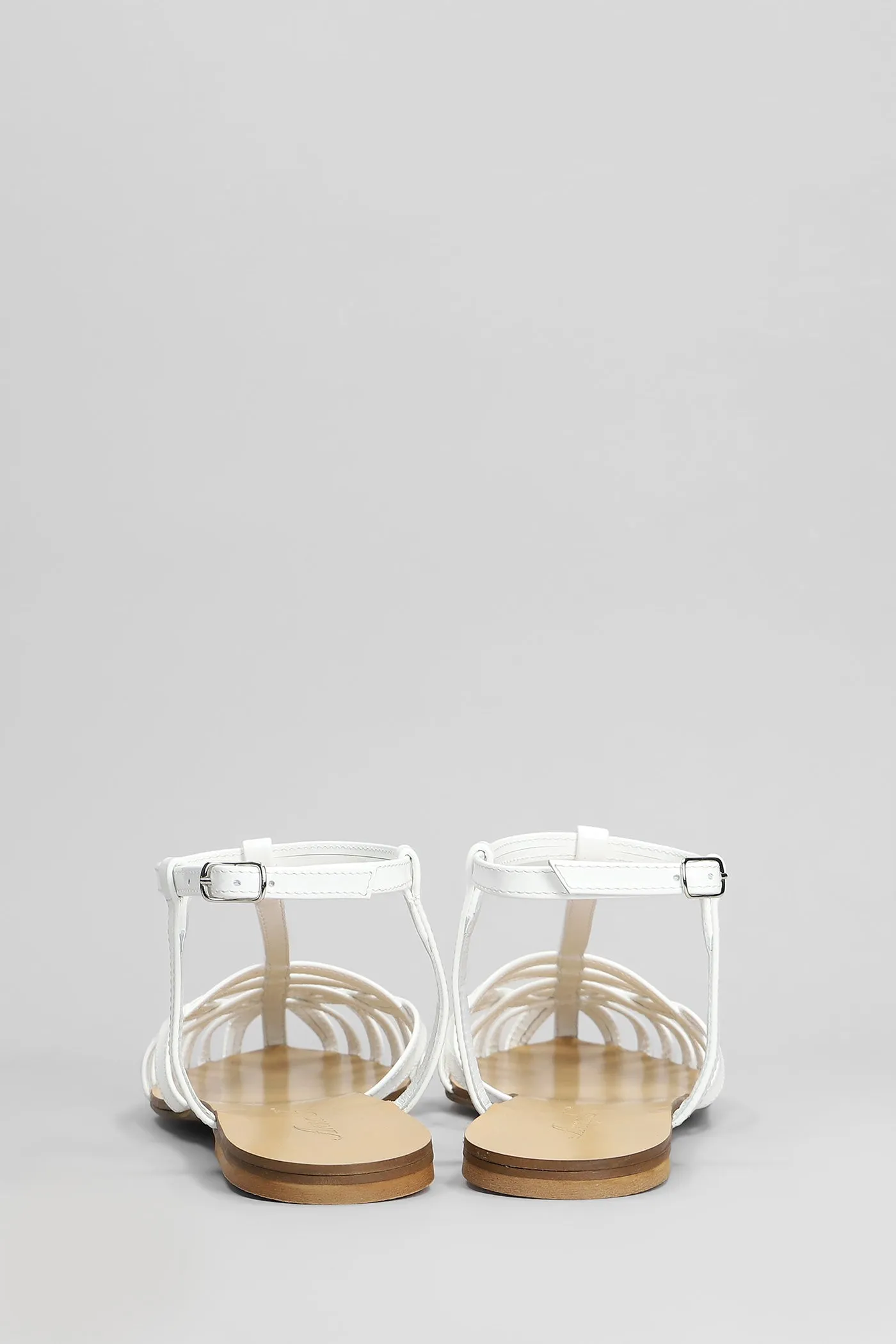 Flats in white patent leather